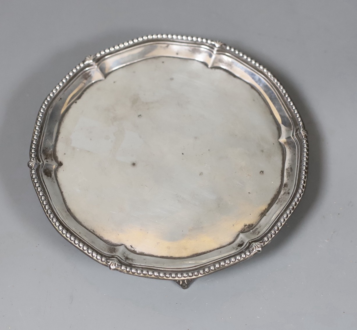 A George III silver waiter, on three claw and ball feet, John Cox? London, 1774, 15.4cm, 7oz.